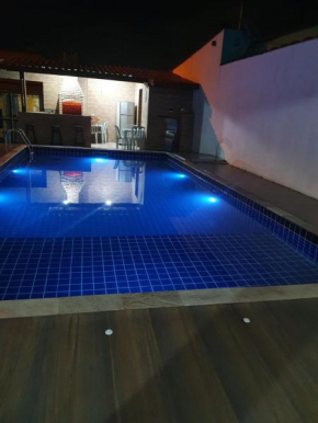 Casa com piscina - Praia Grande